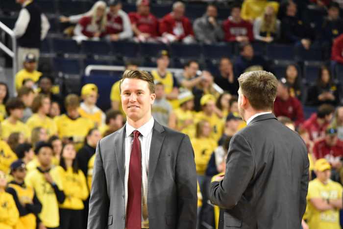 Clif Marshall takes the Indiana Hoosiers through pregame warmups before their matchup with the Michigan Wolverines.